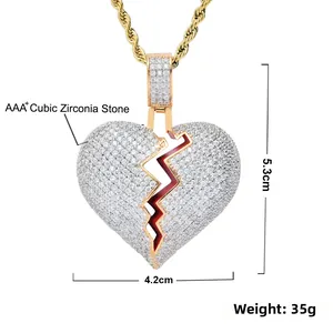 Détail du pendentif cœur brisé doré avec zircons blancs et dimensions précises