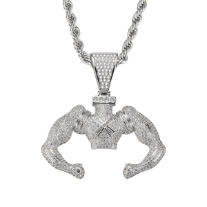 Macro shot of a silver hip-hop bodybuilder pendant with shimmering micro zircons