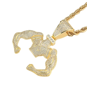 Iced out muscle man pendant necklace with cross detail and gold plated twist chain