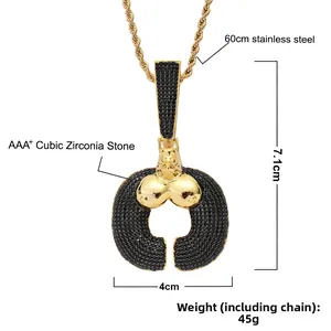 Détail du pendentif gorille hip-hop avec zircons noirs et chaîne torsadée dorée