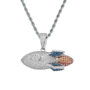 Detailed macro view of 925 silver rocket pendant with colorful zircon stones on rope chain