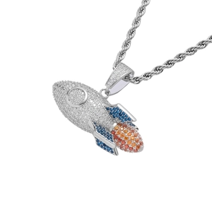 Detail of 925 silver rocket pendant featuring colorful cubic zirconia on rope chain