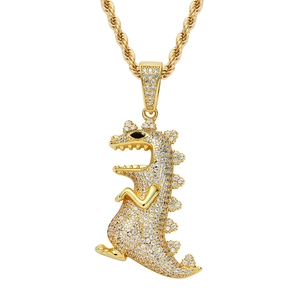Iced out hip hop dinosaur pendant necklace in gold finish with micro-pave cubic zirconia