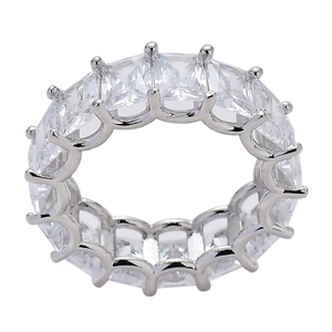 Macro shot of silver eternity ring featuring square cut cubic zirconia stones