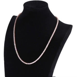 Detailed rose gold tennis necklace with single row white cubic zirconia on black bust