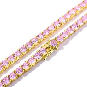 Golden 4mm tennis chain with pink round cubic zirconia stones and a folding clasp