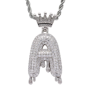 Detailed macro view of Drip Crown Letter A pendant with micro-pave cubic zirconia