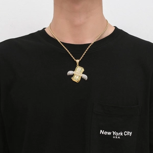 Hip hop dollar bundle pendant with wings and green zircons on gold rope chain