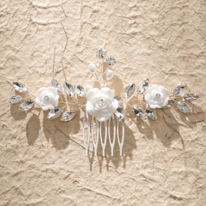 Handmade bridal hair comb with white resin flowers, sparkling rhinestones and pearls
