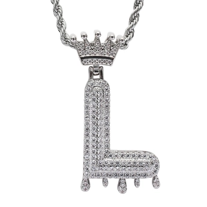 Close-up of hip hop crown letter L pendant with silver plating and micro-set cubic zirconia