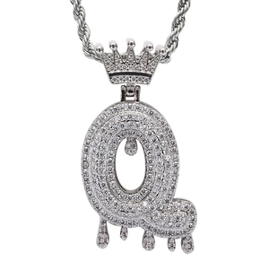 Macro view of silver Hip Hop Q-letter pendant with crown and micro-pave zircons