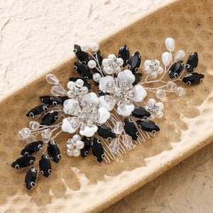 Handmade bridal hair comb with white enamel flowers, pearls, and black rhinestones