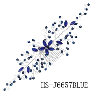 Handmade bridal hair comb with blue crystal flowers and silver wire botanical details