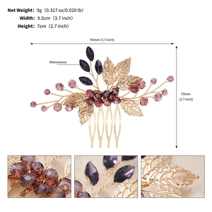 Detailed close-up of bridal gold leaf hair comb with purple rhinestones and beads