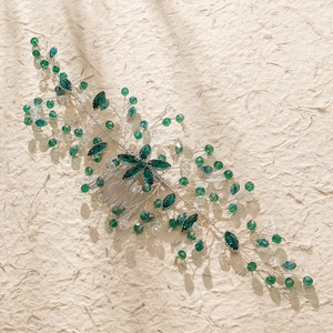 Handmade emerald green crystal hair comb with silver wire branch design for brides