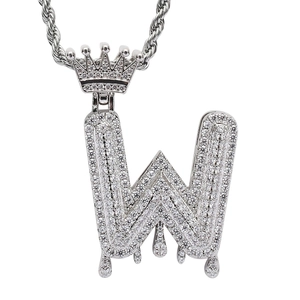 Close-up of hip hop crown letter W pendant with micro-paved zircons and rope chain