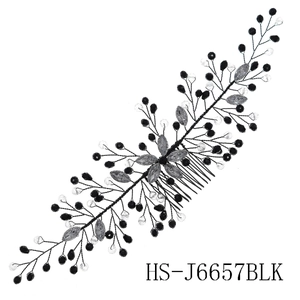 Detail view of handmade bridal hair comb with black wire, grey crystals and floral gems