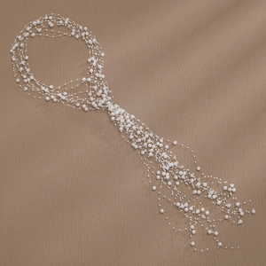 Elegant white pearl tassel headband with long layered beads for bridal wedding hair