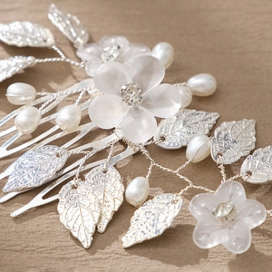 Silver bridal hair comb with resin flowers, pearls, and crystals for weddings