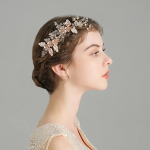 Exquisite bridal hair comb with pink crystal flowers and pearls for wedding hairstyles