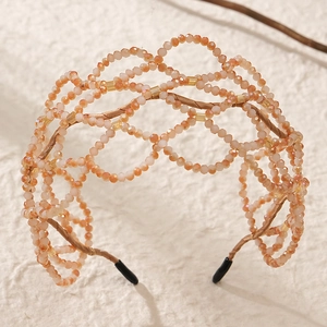 Luxurious handmade beaded headband with pink crystal lace pattern for weddings
