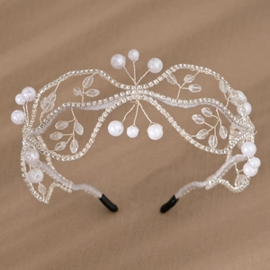 Elegant bridal hair hoop with white pearls and crystal vine design for weddings