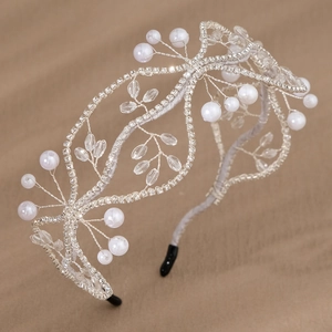Elegant bridal crystal tiara with white pearls and silver beaded floral design for weddings