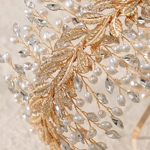 Exquisite bridal headband with gold leaves, white pearls and sparkling marquise crystals