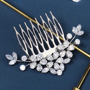Detail of 10-tooth silver bridal hair comb with sparkling marquise and drop zircons