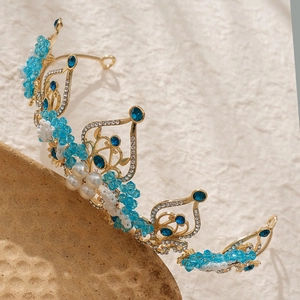 Baroque bridal crown with sky blue crystals and white pearls on golden metal frame