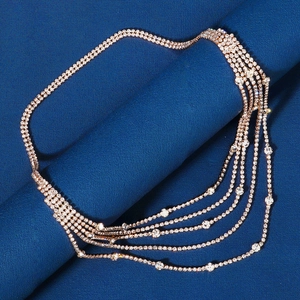 Detail of rose gold bridal head chain with multi-layer white rhinestones for wedding