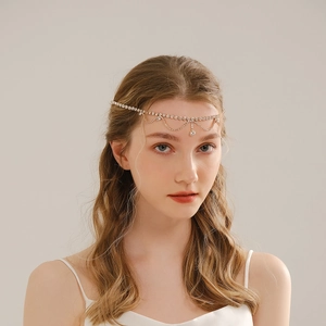 Detailed view of bohemian bridal head chain with sparkling rhinestones and drop pendants