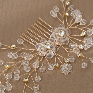 Elegant gold bridal hair comb with handmade crystal beads and floral leaf design
