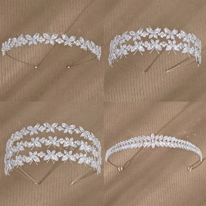 Elegante silberne Braut-Haarbänder mit Zirkonia-Steinen in vier Schmetterlingsdesigns