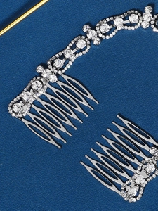 Detailed close-up of sparkling silver bridal hair combs with dense rhinestone inlays