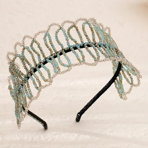 Elegant wavy beaded headband with blue and champagne crystals for a wedding look