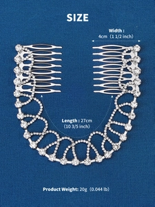 Detail of silver bridal hair comb with rhinestone chains on blue textured background