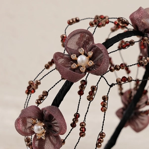 Handmade bridal headband with dark purple fabric flowers and crystal beaded accents