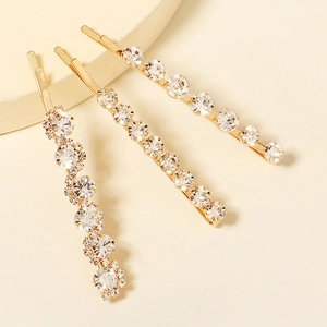 Three-piece gold metal hair clips set with sparkling rhinestones in elegant wave and straight patterns