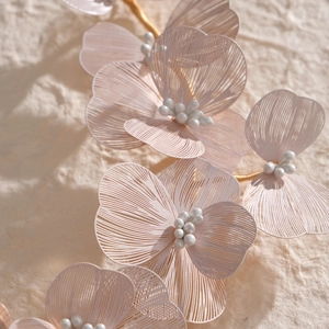 Pink silk floral bridal headband with gold wires and white pearls for wedding hair styling