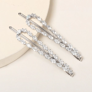 Detailed macro view of silver alloy hair clips featuring sparkling marquise cut zircons