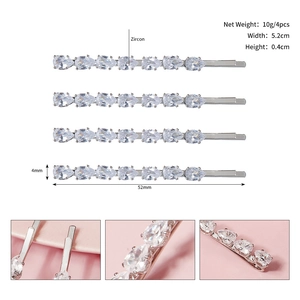 Macro detail of silver zircon hair clips showing dimensions and sparkling pear-cut stones
