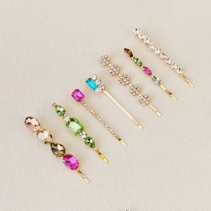 Set of 7 colorful rhinestone hair clips in gold alloy with various crystal shapes