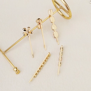 Five-piece gold rhinestone hair clip set with pearls and floral designs for women
