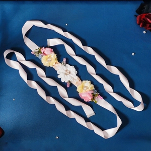 Floral bridal sash with pink satin ribbon, fabric flowers and sparkling rhinestones
