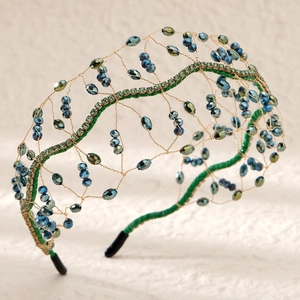 Luxurious handmade crystal bridal headband with green velvet and woven blue beads
