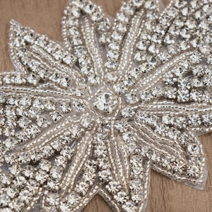 Sparkling silver bridal headband with crystal leaf rhinestones and beads decoration