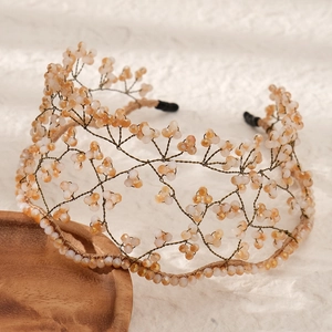 Luxurious champagne crystal braided bridal headband with handmade golden wire design