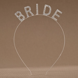 Detailed view of silver metal headband with BRIDE lettering and sparkly rhinestones