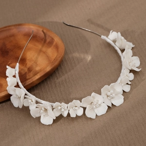 White clay flower bridal headband with handmade crystals and pearls for wedding hair styling